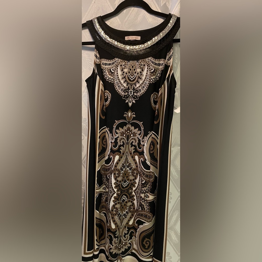 Classy Design Dress. Lovely Cleopatra neck, with metallic design.